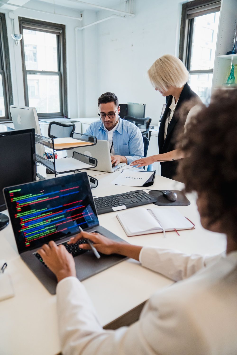 A product team collaborating around software work