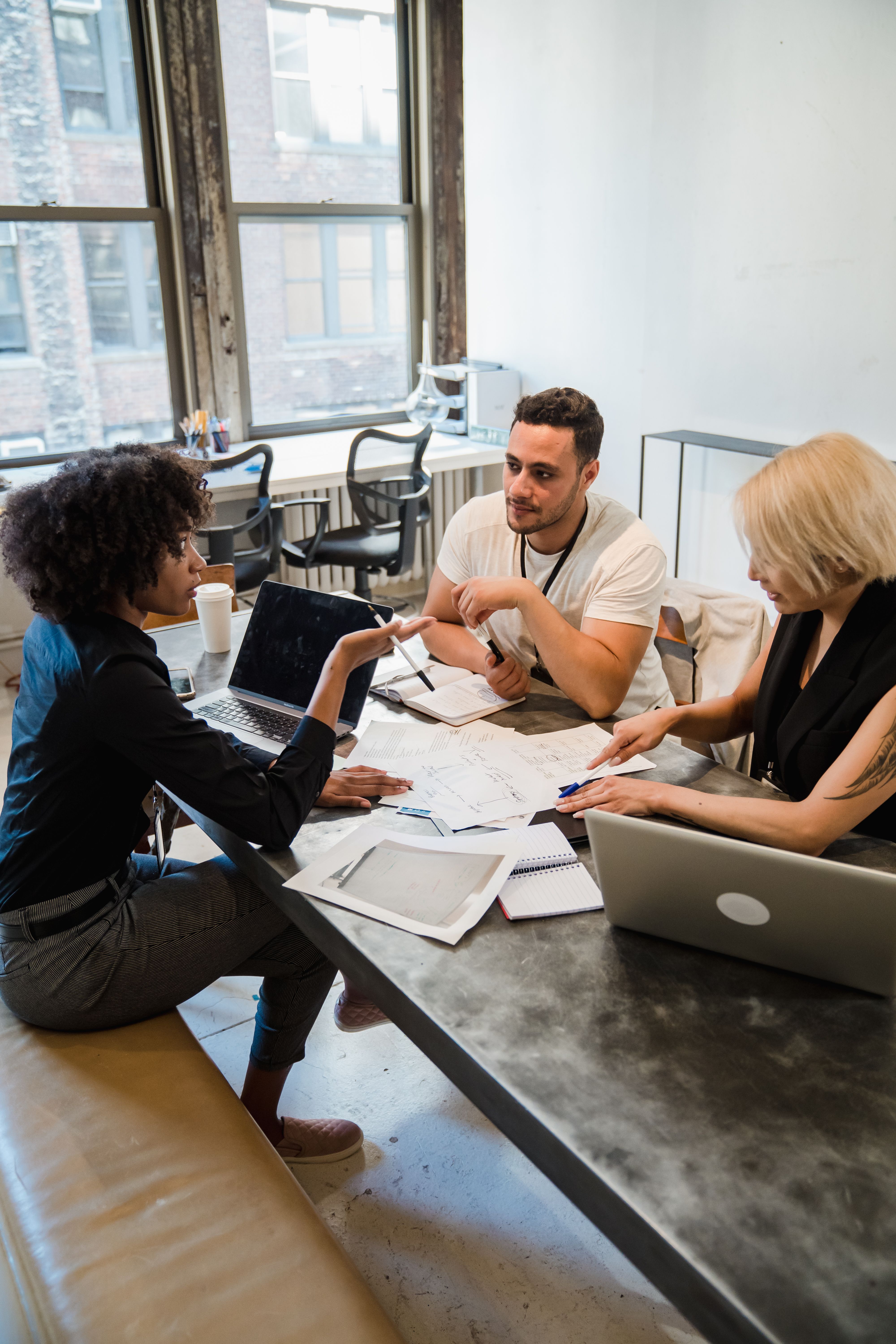 A product team discussing an early digital prototype